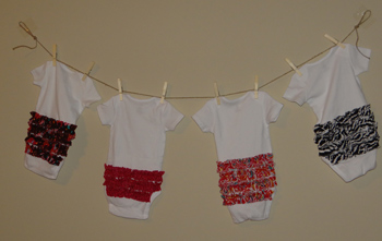 ruffle bum onesies on a clothesline