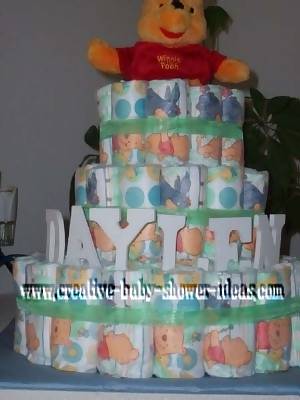 closeup colorful diapers winnie the pooh diaper cake