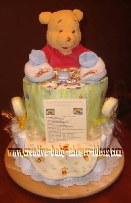 pastel winnie the pooh diaper cake with poem